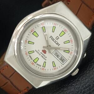 Vintage 1975 Ricoh Automatic Mens Silver Watch W/daydate & Green accents